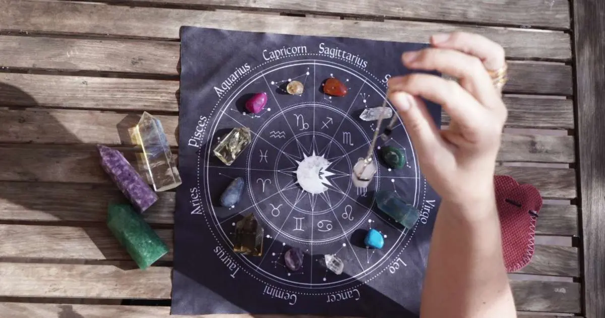 Astrology in a better future shown through zodiac chart and healing crystals